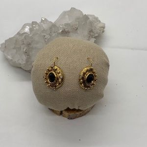 Vintage look gold black dangle earrings.